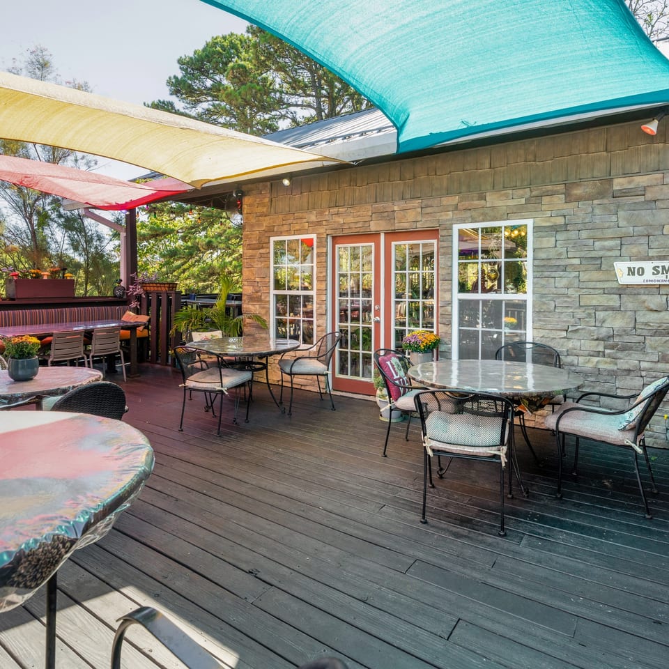 Angler's deck seating beside the patio entrance.